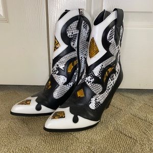 Snake pointed toe boots